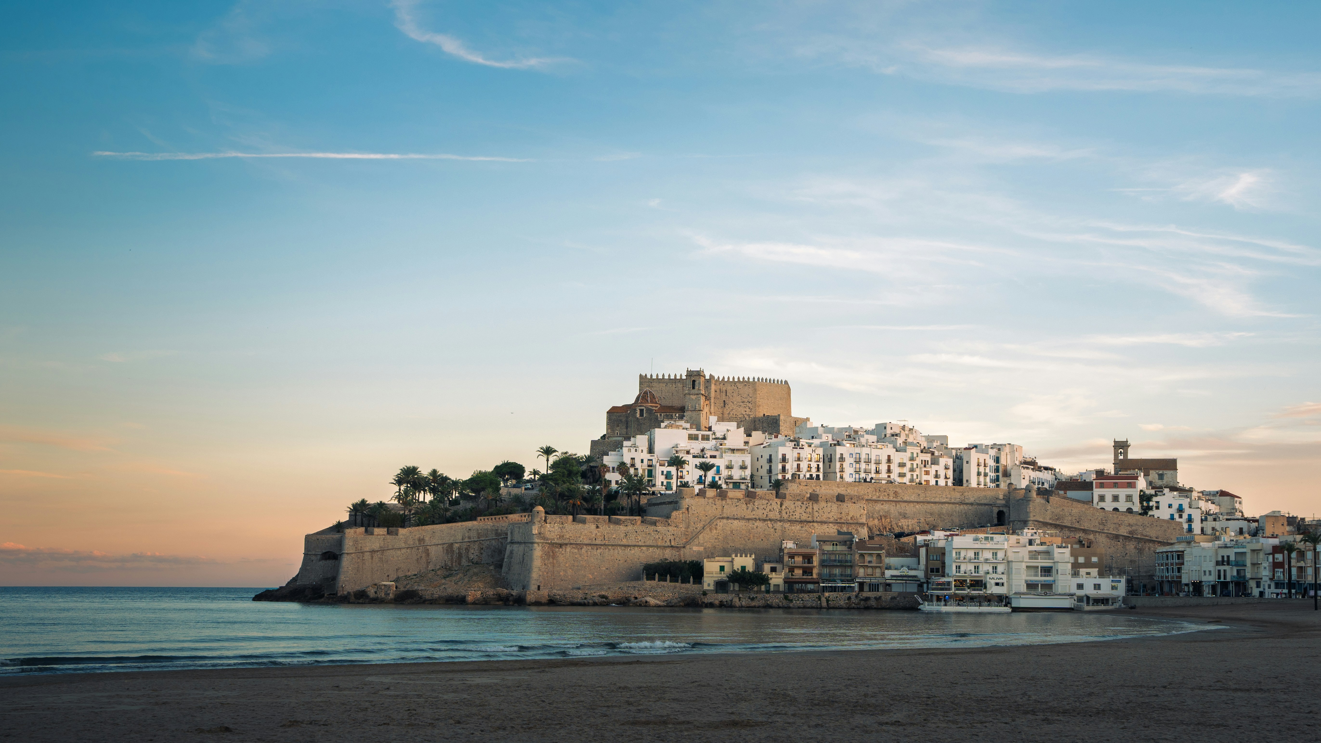 Peniscola castle at sunset over the Mediterranean