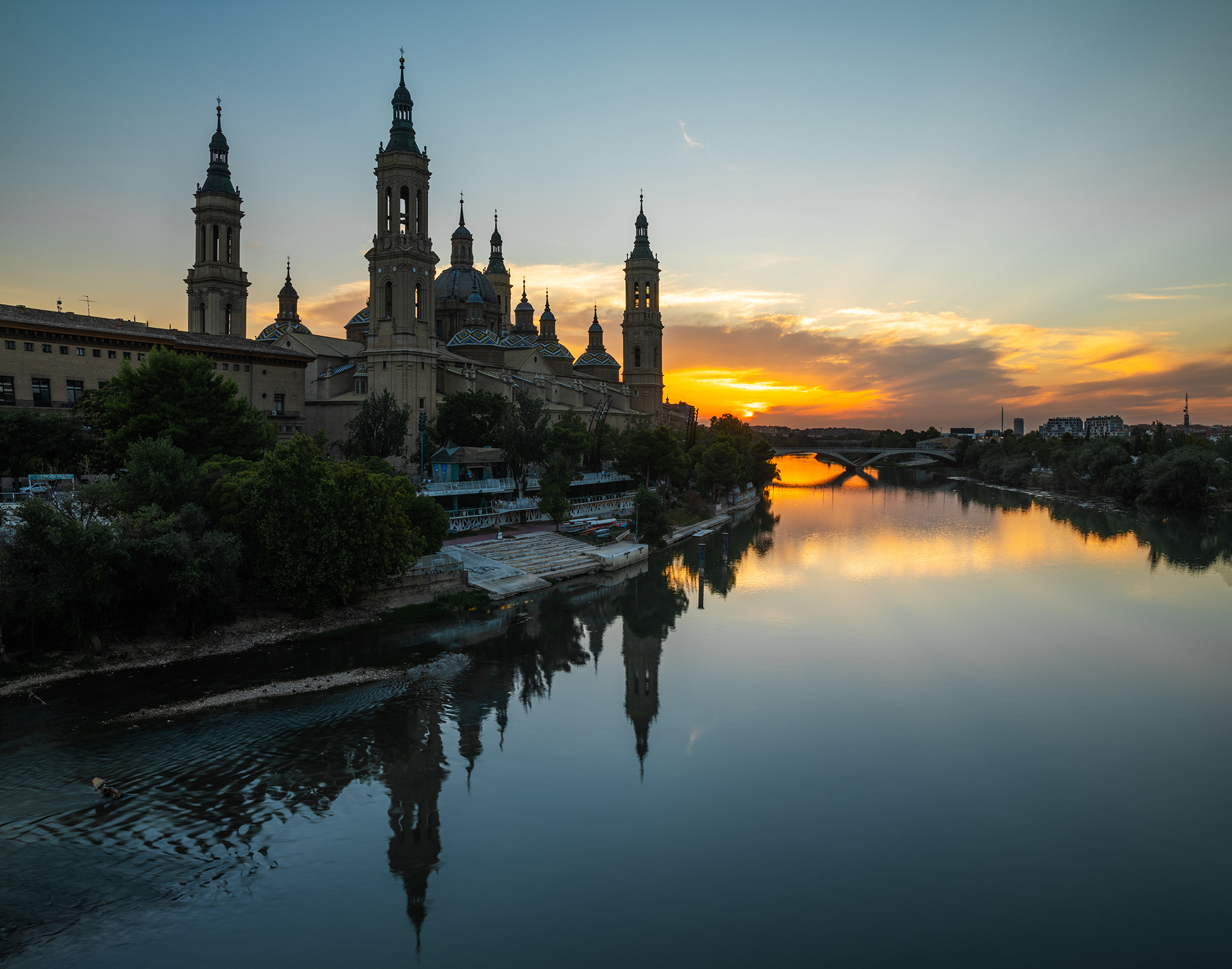The Basilica del Pilar reflected in the Ebro at sunset